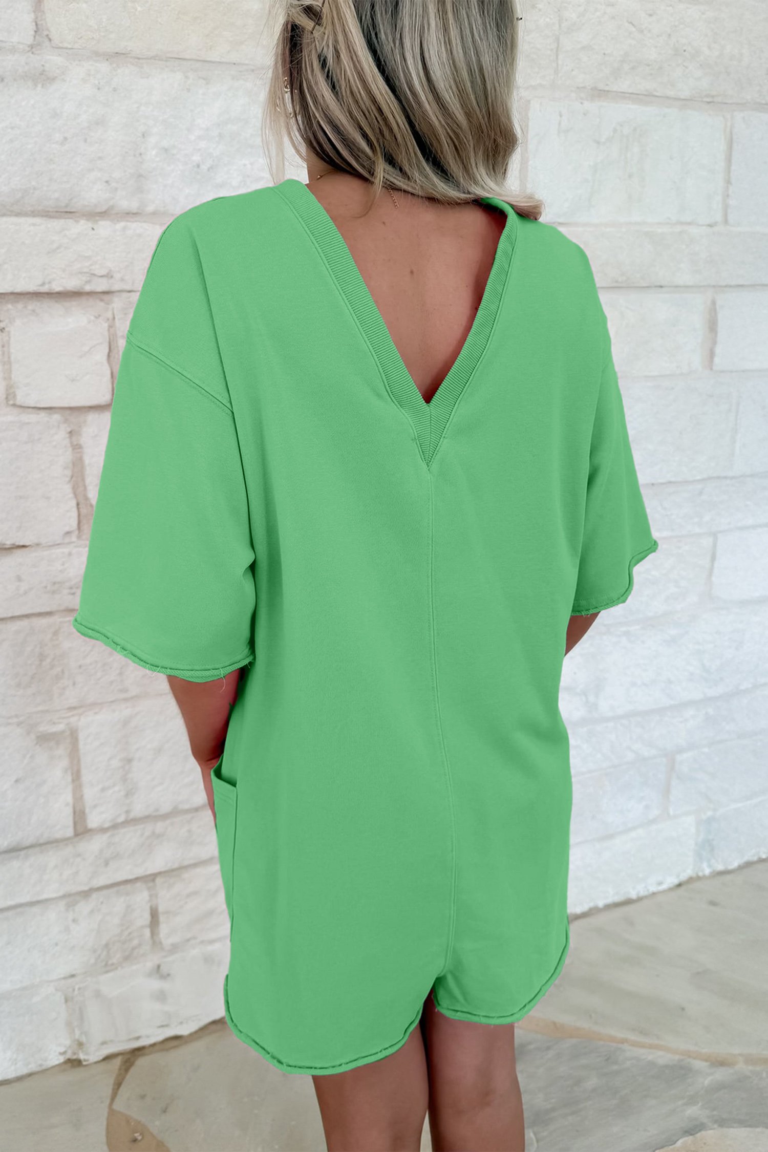 Bright Green Solid Color Raw Edge Half Sleeve Pocketed Loose Romper - Image 2